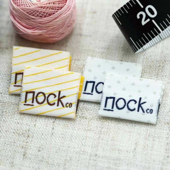 woven labels center fold